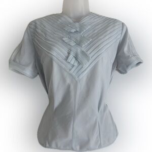 True 1950s vintage pale blue nylon blouse